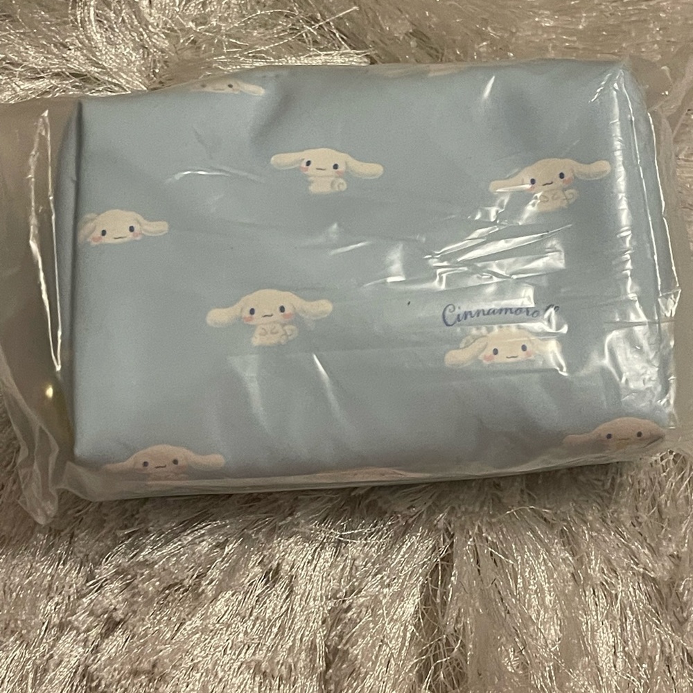 Sanrio cosmetic bag with a comb